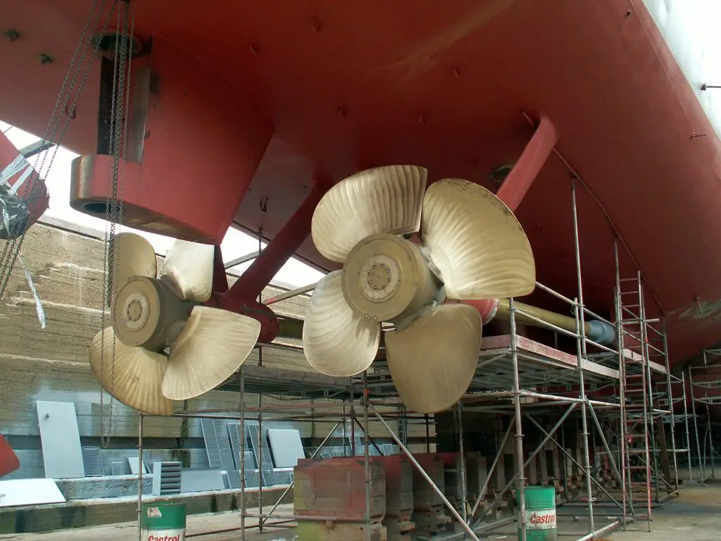A photo showing two controllable pitch propellers on a ship in dry dock